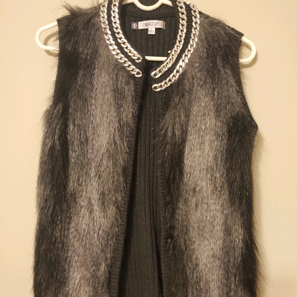 Sleeveless dressy jacket